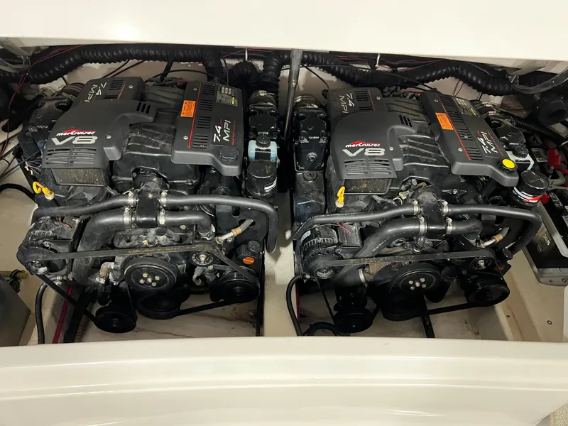 Slide: The Image of Twin V8 engines in a 1999 Formula 330 SS Sun Sport boat. - 13