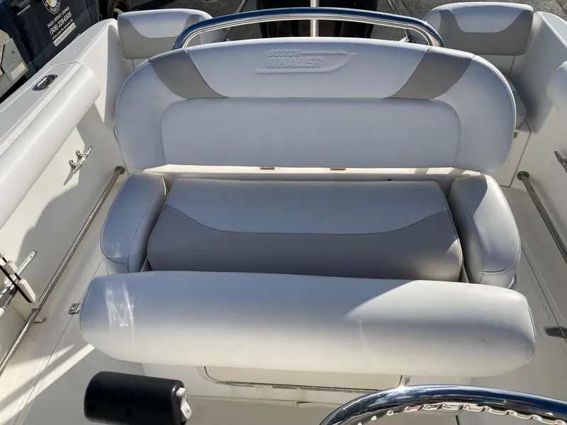 Slide: The Image of 2004 Boston Whaler 210 Outrage boat interior seating. - 14
