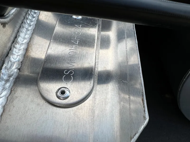 Slide: The Image of Close-up of 2024 Crest Classic LX 220 boat's metal identification plate. - 18