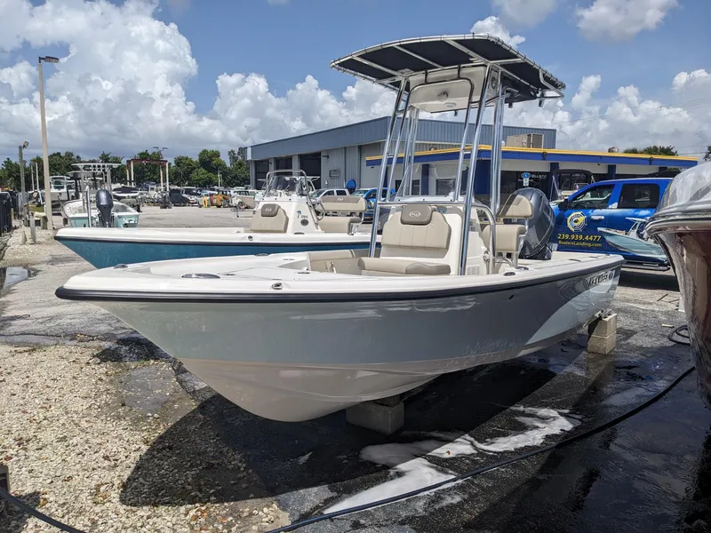 The Image of 2024 Key West 188 Bay Reef boat in a marina under a sunny sky. - 0