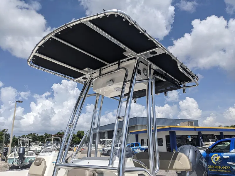 Slide: The Image of 2024 Key West 188 Bay Reef boat with T-top in marina. - 12