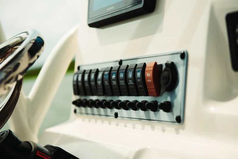 Slide: The Image of Control panel of the 2024 Key West 188 Bay Reef boat. - 22