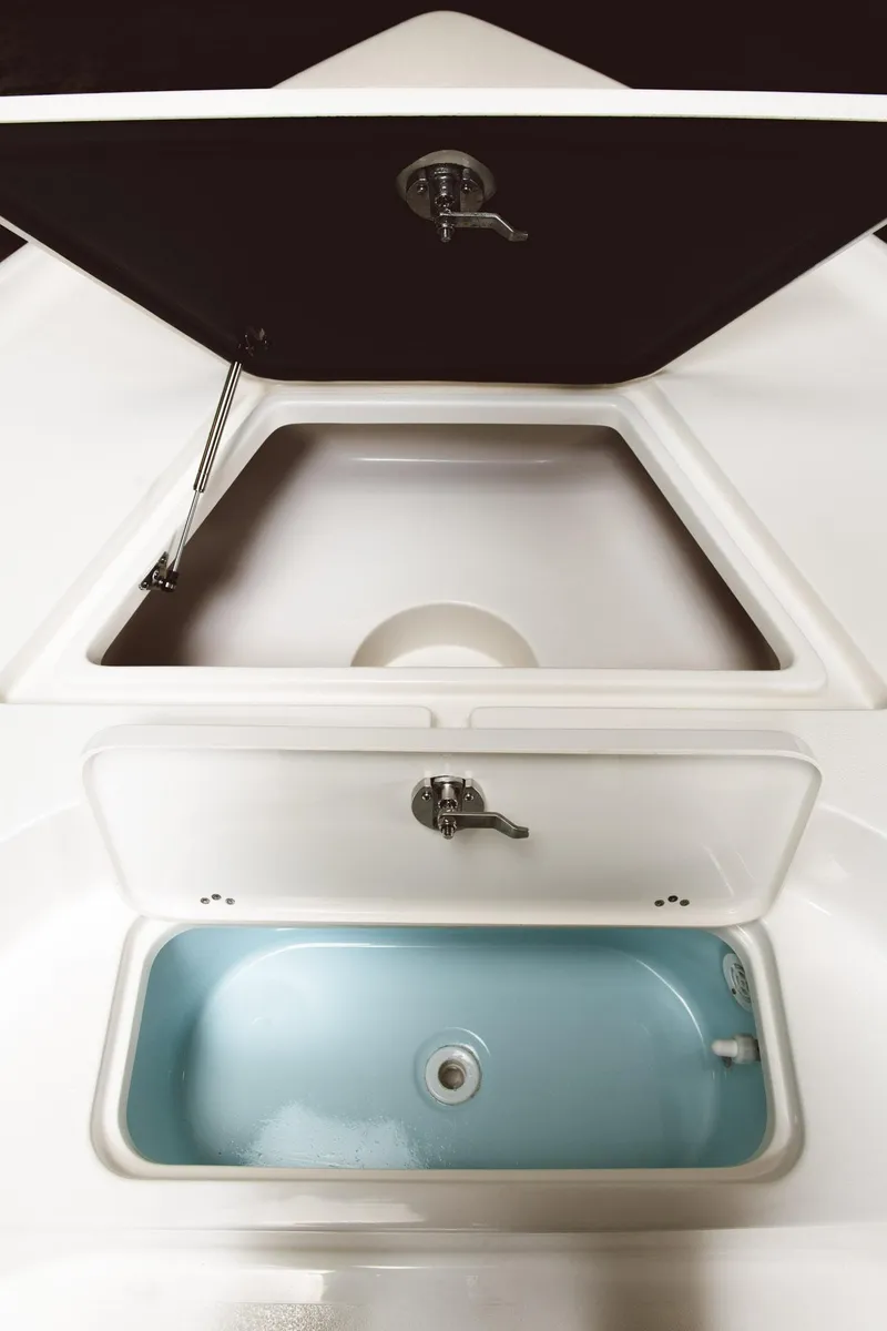 Slide: The Image of 2024 Key West 188 Bay Reef boat storage compartments and livewell. - 44