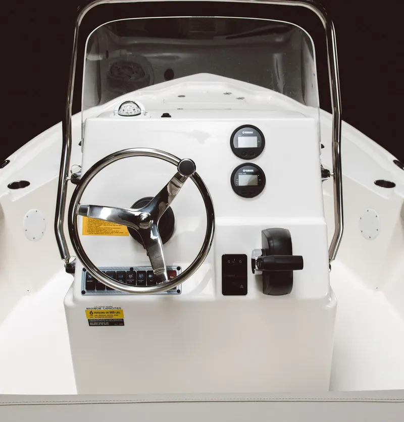 Slide: The Image of 2024 Key West 188 Bay Reef boat console with steering wheel and controls. - 46