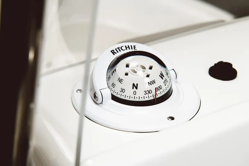 Slide: The Image of Compass on the 2024 Key West 188 Bay Reef boat dashboard. - 48