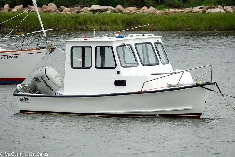 The Image of 2002 Eastern Lobsterman 22 boat with Honda outboard motor on calm water. - 0