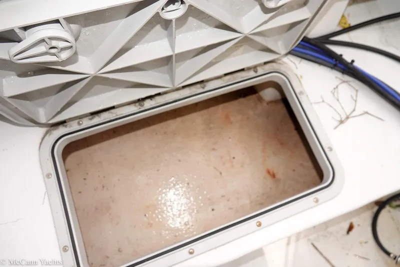 Slide: The Image of Open storage compartment on a 2002 Eastern Lobsterman 22 boat. - 38