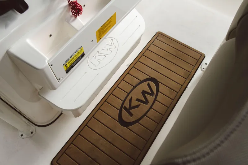 Slide: The Image of 2024 Key West 230 Bay Reef boat interior with KW logo mat. - 29