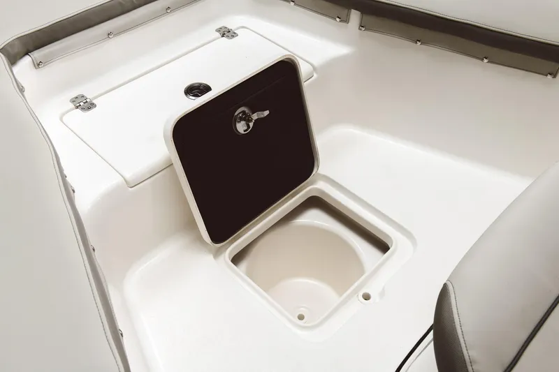 Slide: The Image of 2024 Key West 230 Bay Reef boat storage compartment with open hatch. - 31
