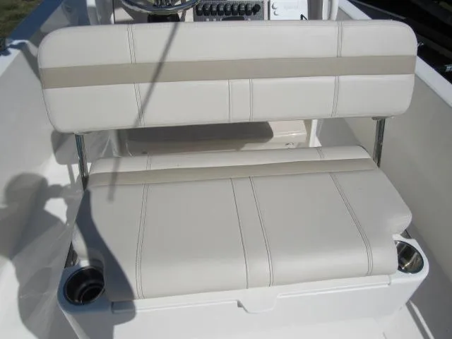 Slide: The Image of 2024 Boston Whaler 250 Dauntless boat seating with cup holders. - 14