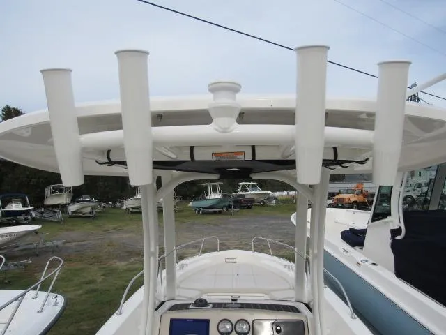 Slide: The Image of 2024 Boston Whaler 250 Dauntless center console with rod holders. - 22