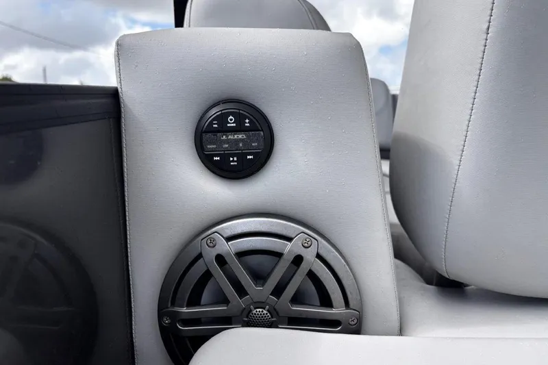Slide: The Image of 2023 Starcraft CX 23 DL BAR boat audio system with JL Audio controls and speaker. - 49