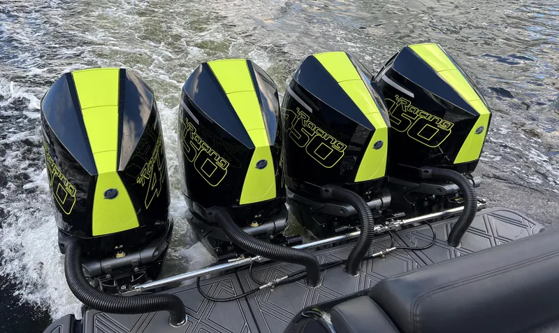 Slide: The Image of 2023 Mystic Powerboats M4200 with quad Mercury 450R outboard engines. - 6