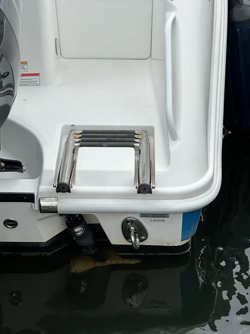 Slide: The Image of 2018 Edgewater 262CX swim platform with retractable ladder. - 19