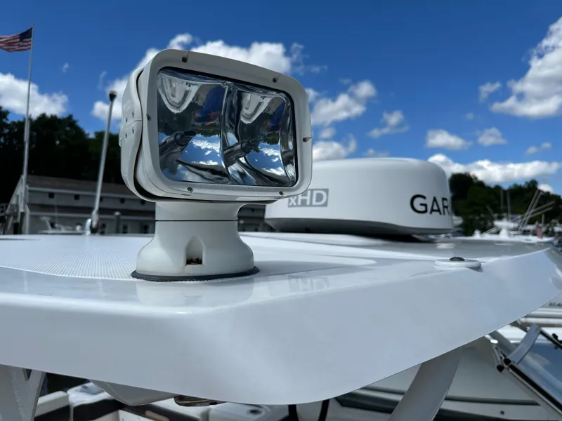 Slide: The Image of Close-up of 2018 Edgewater 262CX boat spotlight and radar. - 20
