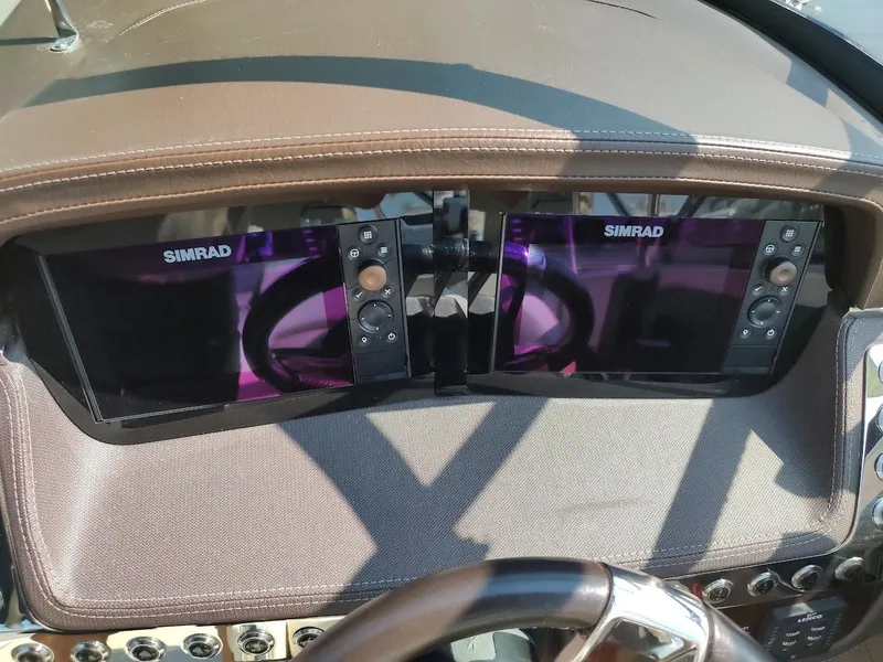 Slide: The Image of Dashboard of 2018 Chaparral 267 SSX with dual Simrad displays. - 31