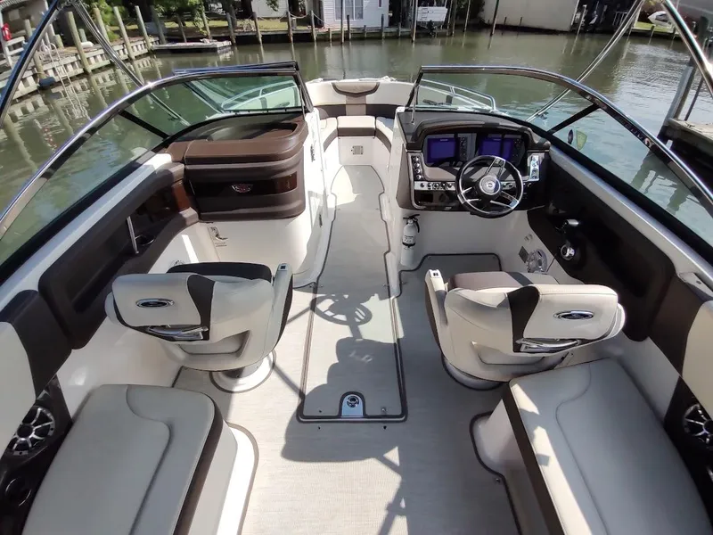 Slide: The Image of Interior of 2018 Chaparral 267 SSX boat with modern seating and dashboard. - 8