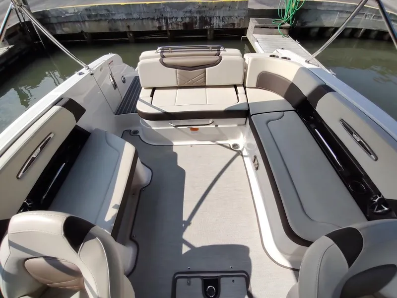 Slide: The Image of 2018 Chaparral 267 SSX boat interior with spacious seating and modern design. - 9