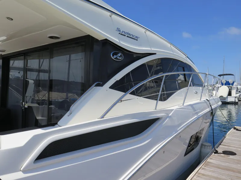 Slide: The Image of 2017 Sea Ray 400 Sundancer yacht docked at marina. - 31