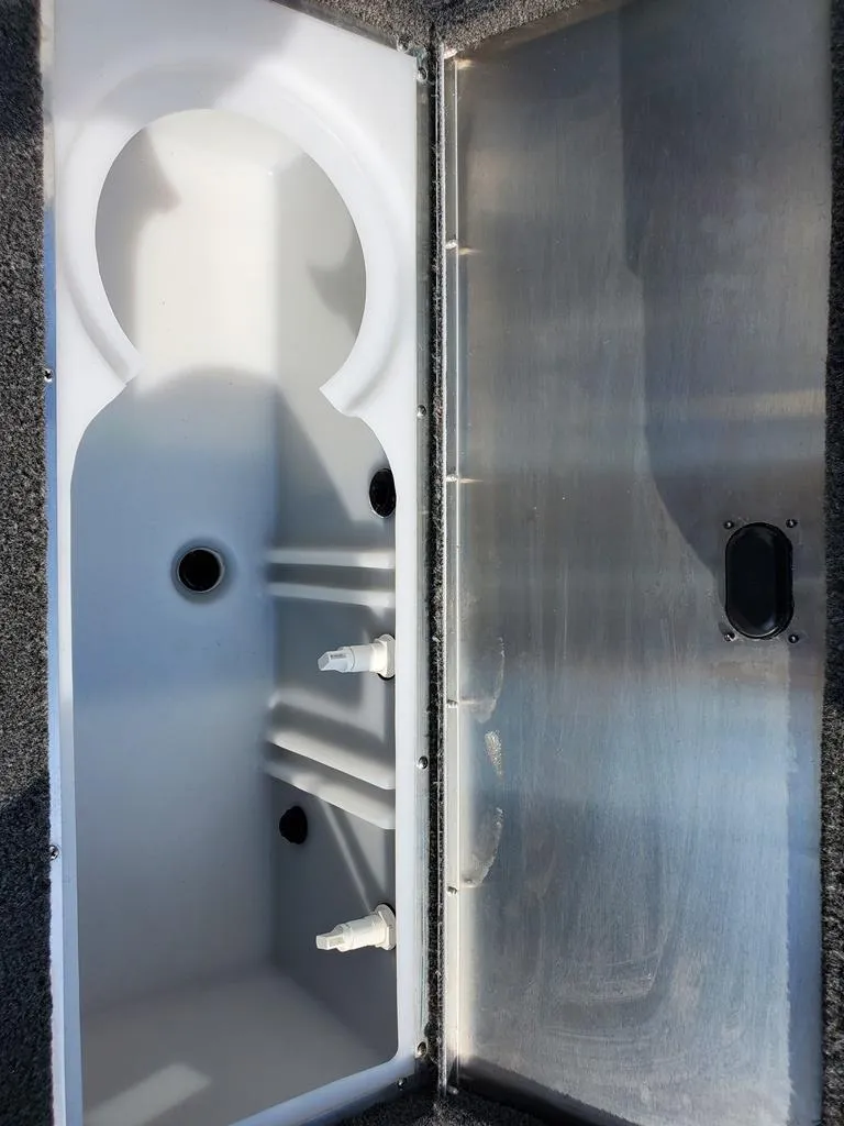 Slide: The Image of Livewell compartment of a 2024 Lowe Stinger 175 fishing boat. - 9