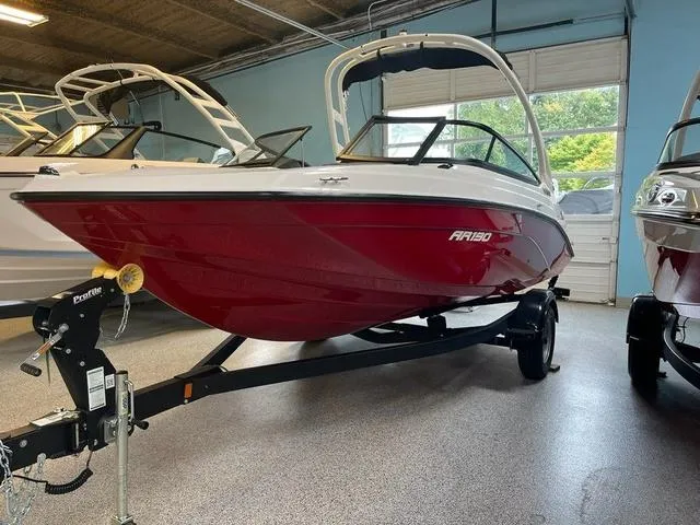 Slide: The Image of 2024 Yamaha Boats AR190 in red and white, side view. - 1