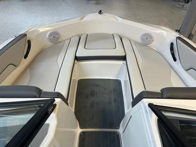 Slide: The Image of 2024 Yamaha Boats AR190 interior with cushioned seating and speakers. - 6