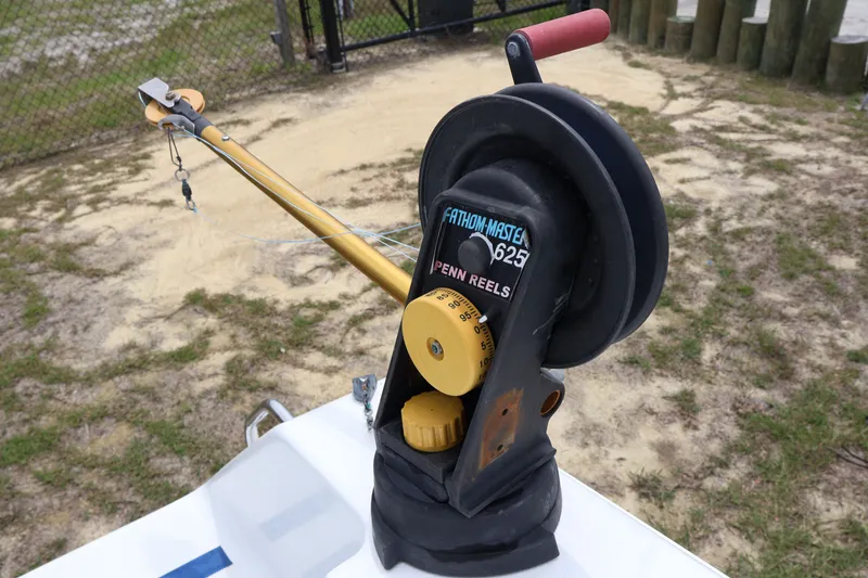 Slide: The Image of Fathom Master 625 Penn Reel on Sea Hunt 24 Gamefish, 2010. - 15