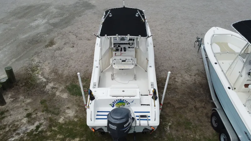 Slide: The Image of Aerial view of a 2010 Sea Hunt 24 Gamefish boat at dock. - 6