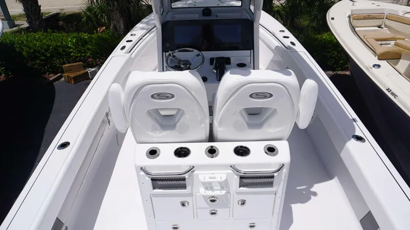 Slide: The Image of 2024 Sportsman 267 Masters OE boat interior with dual seats and control console. - 6