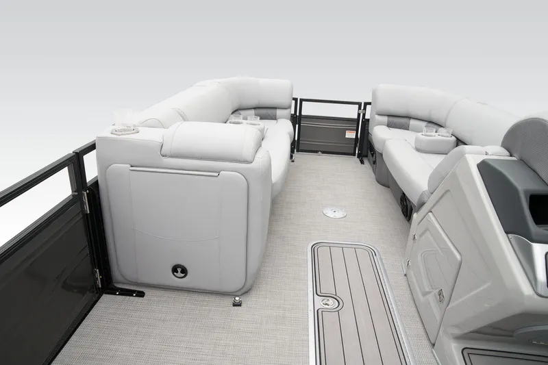 Slide: The Image of 2024 Regency 230 LE3 Sport pontoon boat interior with plush seating. - 27