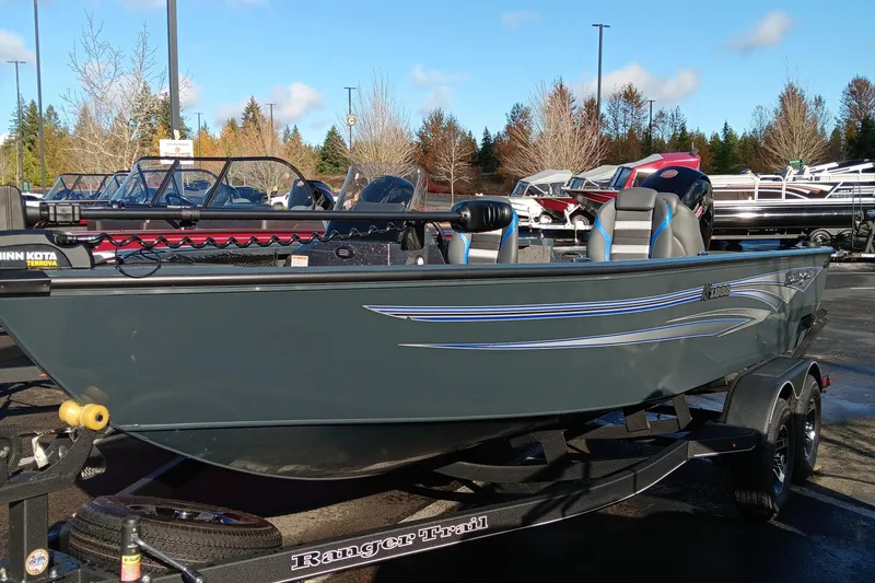 The Image of 2024 Ranger VS1882SC Angler boat on trailer in outdoor showroom. - 0