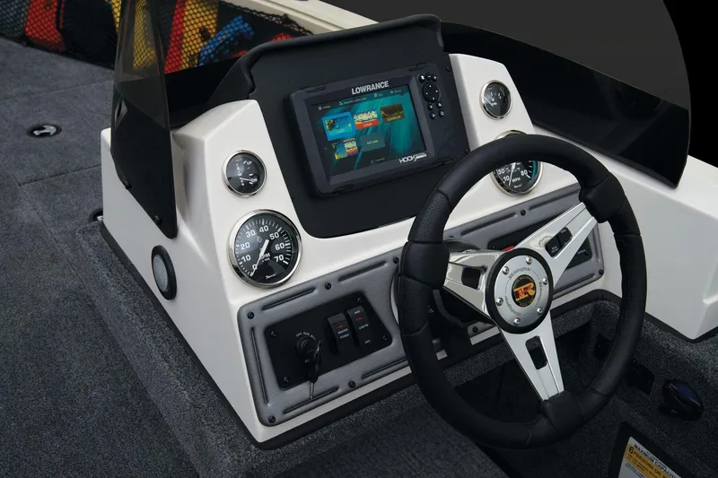 Slide: The Image of 2024 Ranger VS1882SC Angler boat dashboard with Lowrance fishfinder and steering wheel. - 39