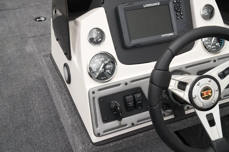 Slide: The Image of 2024 Ranger VS1882SC Angler boat dashboard with Lowrance fishfinder and steering wheel. - 43
