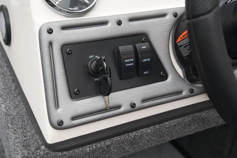 Slide: The Image of Control panel of 2024 Ranger VS1882SC Angler boat with ignition key and switches. - 44