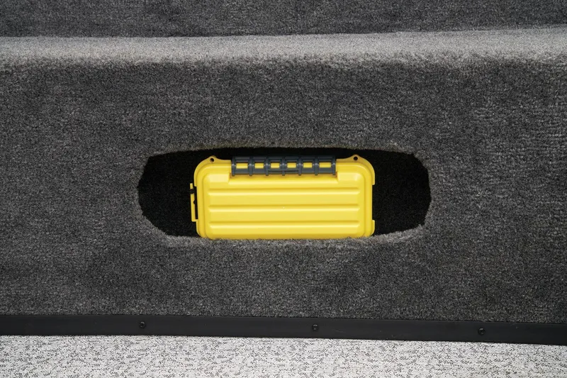 Slide: The Image of Yellow storage box in 2024 Ranger VS1882SC Angler boat compartment. - 55