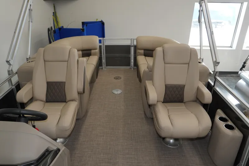 Slide: The Image of 2024 Sun Tracker Party Barge 22 XP3 interior with beige seating and modern design. - 6