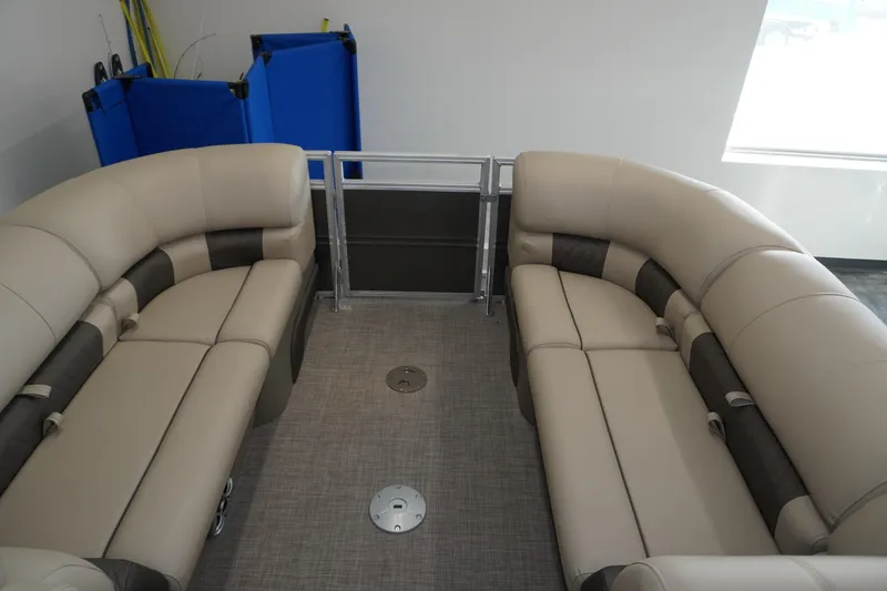 Slide: The Image of 2024 Sun Tracker Party Barge 22 XP3 interior with beige seating and modern design. - 8