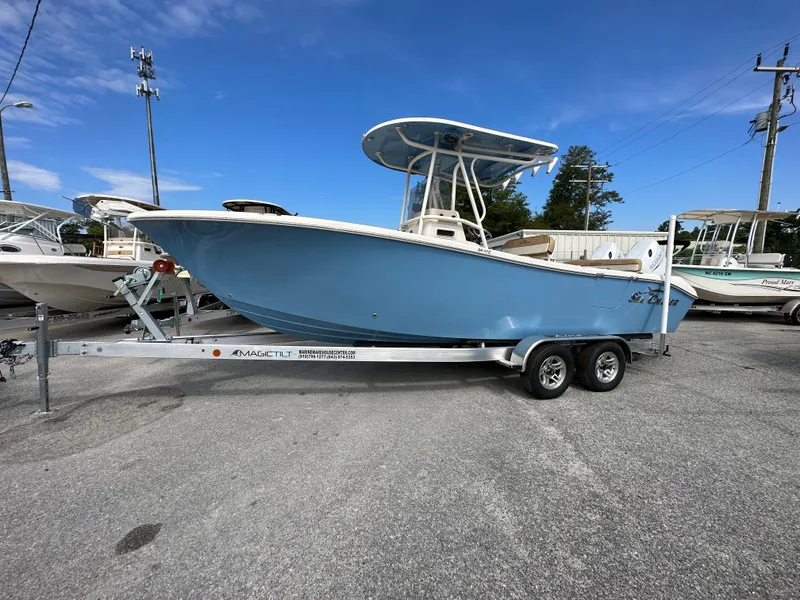 The Image of 2023 Sea Chaser 24 HFC boat on a trailer in a marina. - 0