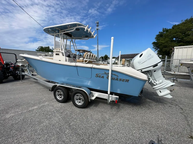 Slide: The Image of 2023 Sea Chaser 24 HFC boat on a trailer, side view. - 1