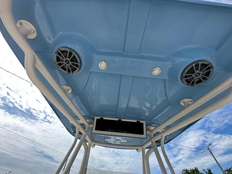 Slide: The Image of 2023 Sea Chaser 24 HFC boat T-top with speakers and lights. - 11