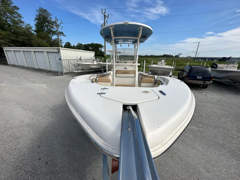 Slide: The Image of 2023 Sea Chaser 24 HFC boat on trailer in outdoor storage area. - 5