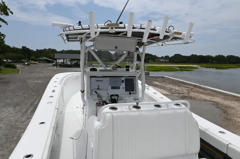 Slide: The Image of 2004 Yellowfin 36 boat with center console and fishing rod holders. - 8