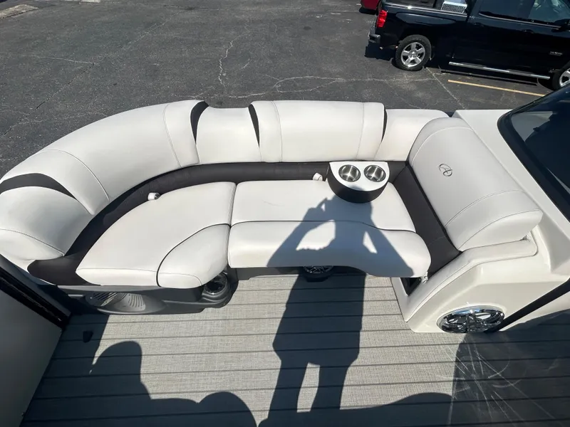 Slide: The Image of 2023 Avalon 2585 EL boat with white and black cushioned seating. - 13