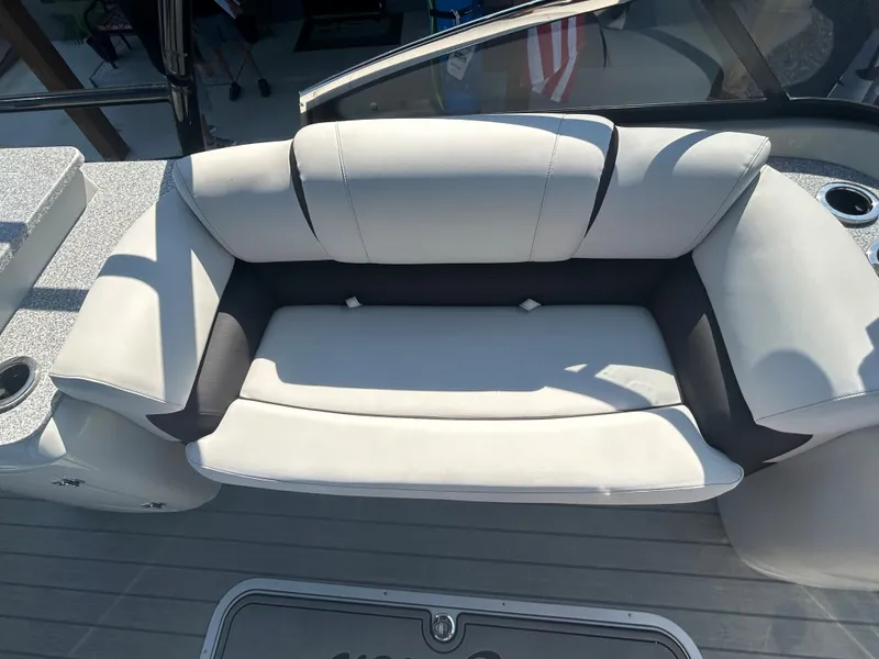 Slide: The Image of 2023 Avalon 2585 EL boat with white and gray cushioned seating. - 20