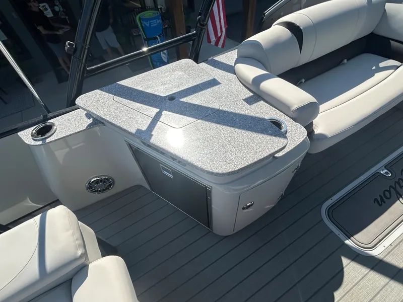 Slide: The Image of 2023 Avalon 2585 EL boat interior with seating and table. - 26
