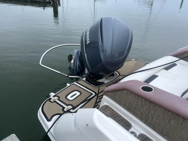 Slide: The Image of 2017 Four Winns 24 Bow Rider with Yamaha outboard motor docked. - 4