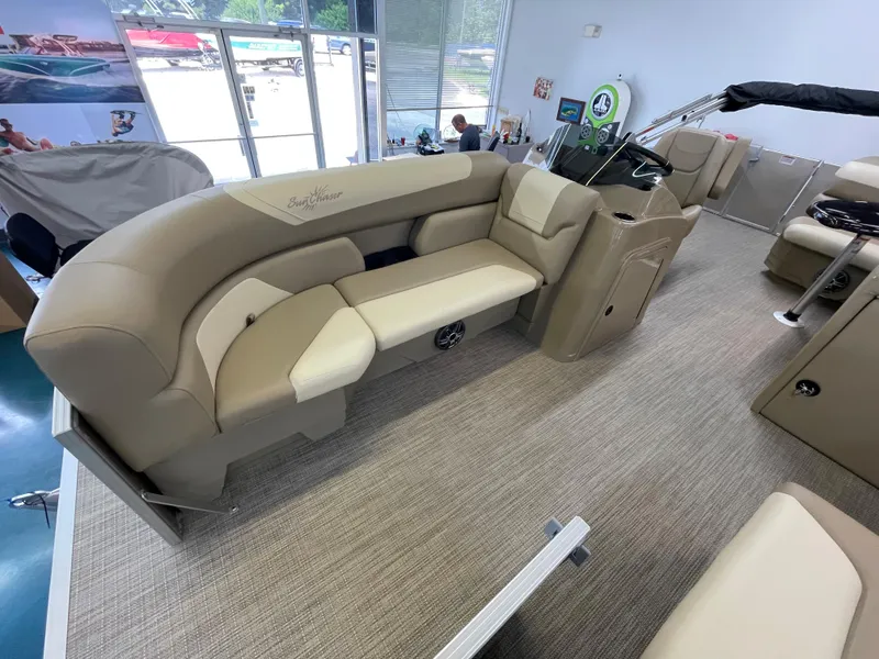 Slide: The Image of 2024 SunChaser Geneva Cruise 20 interior with beige seating and helm station. - 3