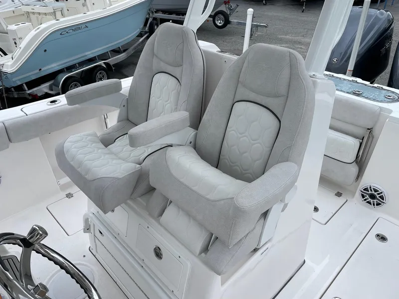 Slide: The Image of 2024 Sea Fox 288 Commander boat seats, featuring plush gray upholstery and ergonomic design. - 10