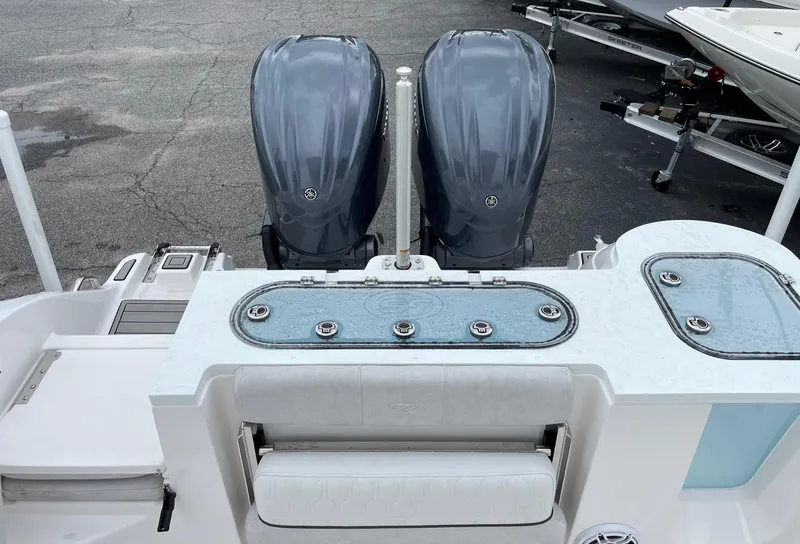 Slide: The Image of 2024 Sea Fox 288 Commander boat with dual outboard engines and fishing station. - 16