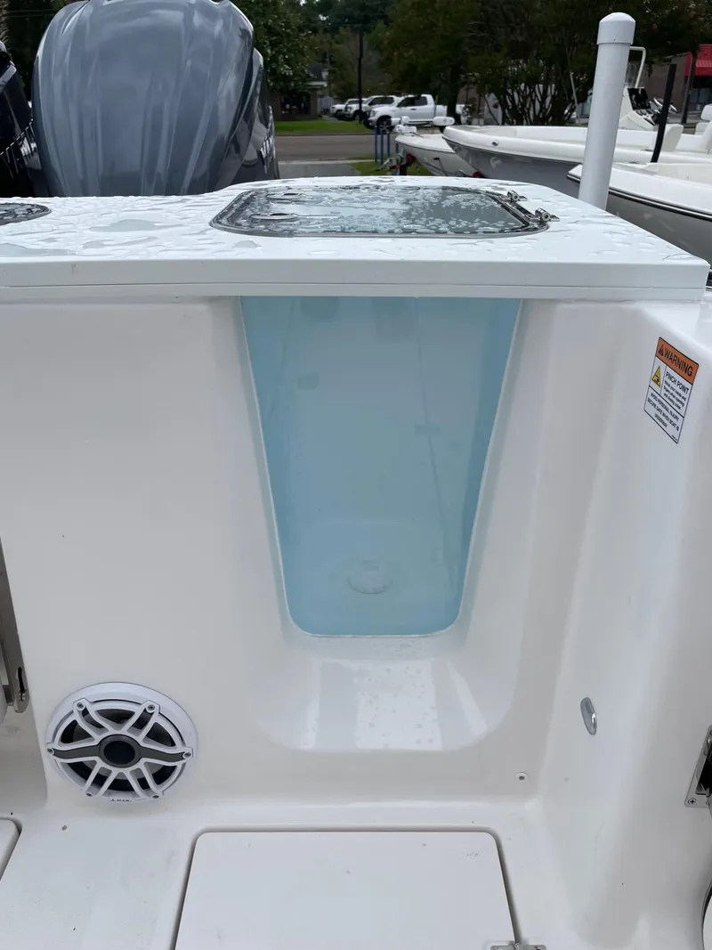 Slide: The Image of 2024 Sea Fox 288 Commander boat with livewell and speaker detail. - 17
